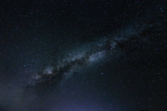 Milky way galaxy with stars and space in the universe background at thailand