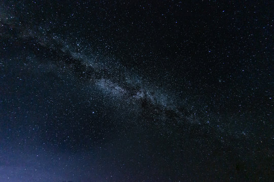 Milky way galaxy with stars and space in the universe background at thailand