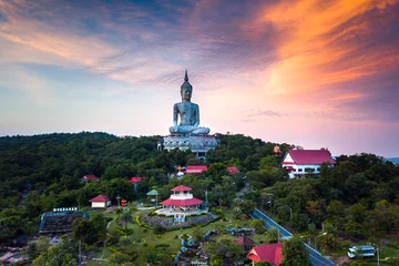 Fotobehang Top view Aerial photo from flying drone.Big Buddha Wat Phu Manorom Mukdahan Thailand.Buddha on the mountain. © noon@photo