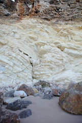 NB__9396 Colourful rocks on a beach in Sagres Portugal