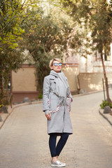 Young blond woman with sunglases on the street