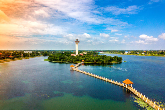 Top view Aerial photo from flying drone over Chalermprakiat Tower at Koh Klang nam public park in Sisaket Thailand.
