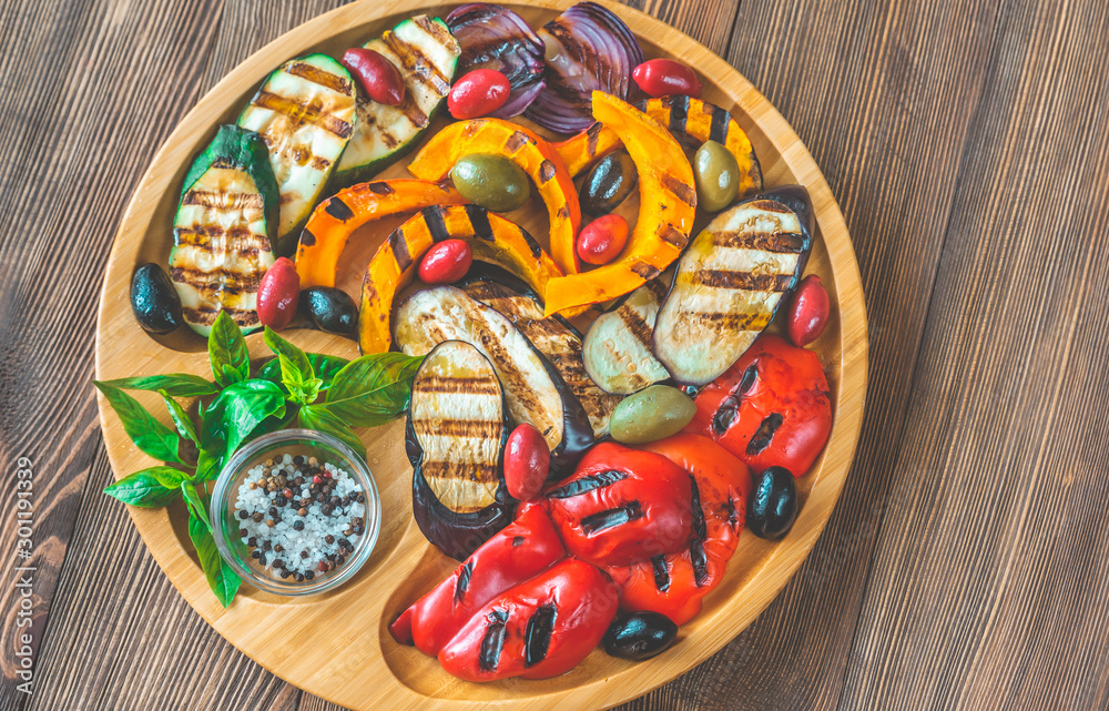 Sticker grilled vegetables on the wooden tray