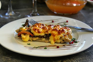 grilled salmon steak with vegetables and sauce