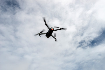Black silhouette Flying drone and cloud sky