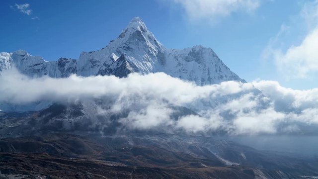 4K Time lapse View to Ama Dablam 6814m peak near Dingboche settlement in Sagarmatha National Park, Nepal. Everest Base Camp (EBC) trekking route.