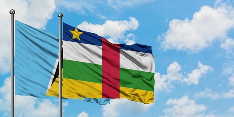 Saint Lucia and Central African Republic flag waving in the wind against white cloudy blue sky together. Diplomacy concept, international relations.