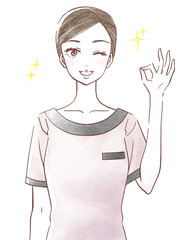 OKポーズのエステティシャン