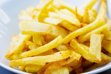 Golden French fries potatoes ready to be eaten