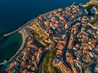Aerial view of Pizzo Calabro, pier, castle, Calabria, tourism Italy. Panoramic view of the small town of Pizzo Calabro by the sea. Houses on the rock. On the cliff stands the Aragonese castle.