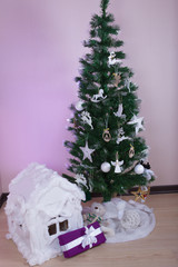 Artificial Christmas tree and cotton wool house, Christmas decorations
