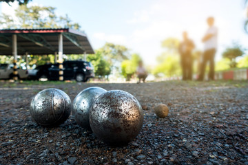 Petanque on blurry background.Petanque French Traditional Game.Photo by select focus.