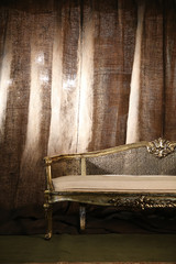 Jute made Kurt-en with back-light background and sofa on carpet