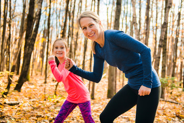 Healthy lifestyle mother and child running outdoor