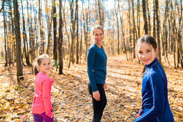 Healthy lifestyle mother and child running outdoor