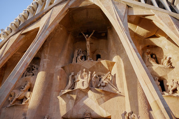Sagrada Familia church exterior by Antoni Gaudi in Barcelona. (Church of the Holy Family). Sculptures on the facade, outer wall.