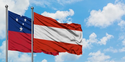 Samoa and Austria flag waving in the wind against white cloudy blue sky together. Diplomacy concept, international relations.