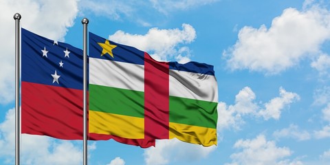 Samoa and Central African Republic flag waving in the wind against white cloudy blue sky together. Diplomacy concept, international relations.