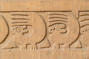  adobe walls and decorations in the archaeological site of Chan Chan made by the Chimu civilization near Trujillo, Peru