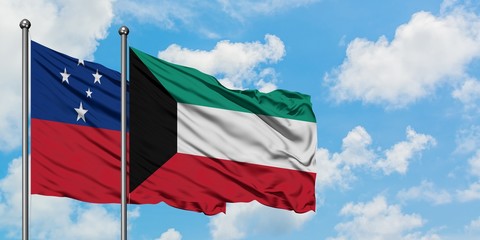 Samoa and Kuwait flag waving in the wind against white cloudy blue sky together. Diplomacy concept, international relations.