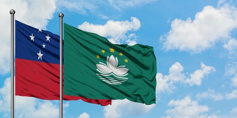 Samoa and Macao flag waving in the wind against white cloudy blue sky together. Diplomacy concept, international relations.