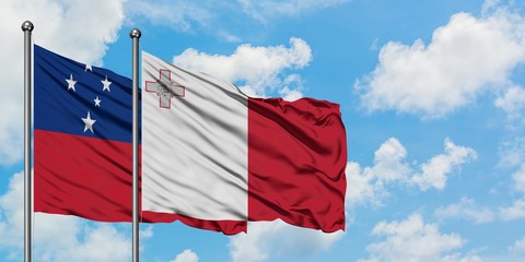 Samoa and Malta flag waving in the wind against white cloudy blue sky together. Diplomacy concept, international relations.