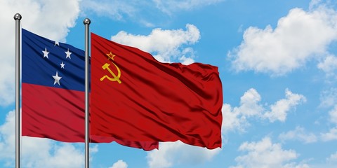 Samoa and Soviet Union flag waving in the wind against white cloudy blue sky together. Diplomacy concept, international relations.