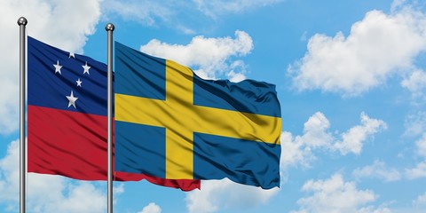 Samoa and Sweden flag waving in the wind against white cloudy blue sky together. Diplomacy concept, international relations.