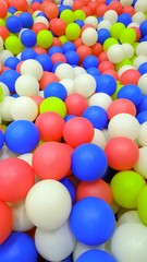 Fototapeta na wymiar Background texture of plastic multicolored balls. game room