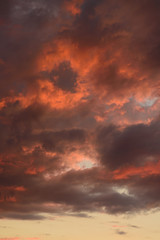 Dark sky with red clouds. Horizontal shot.