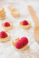 sweet tartlets or raspberry cakes