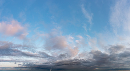 Obraz premium Fantastic clouds against blue sky, panorama