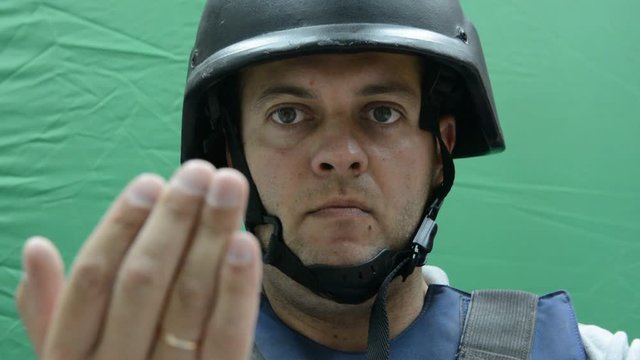 Male Security Guard with bulletproof halmet On chromakey background