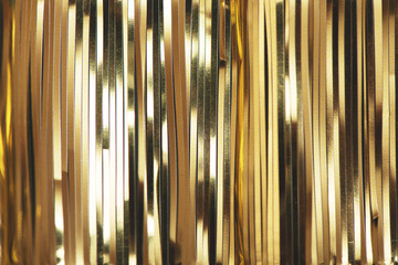 Golden foil tinsel strips.