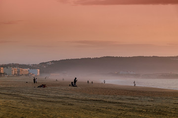 Fototapeta na wymiar Evening time at Atlantic ocean in Nazare, Portugal.