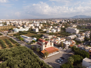 Top view of the Orthodox Church and the city. Heraklion city, island of Crete. Aero photo shooting