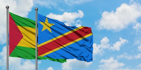 Sao Tome And Principe and Congo flag waving in the wind against white cloudy blue sky together. Diplomacy concept, international relations.