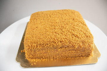 Golden Honey Cake on white.