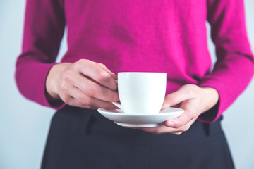 woman hand cup of coffee
