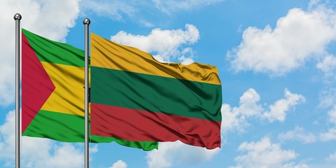Sao Tome And Principe and Lithuania flag waving in the wind against white cloudy blue sky together. Diplomacy concept, international relations.