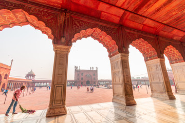 Fototapeta premium The red Jama Mosque (Masjid Jahan Numa), built in the 17th in Mughal architecture, is one of the largest mosques in India