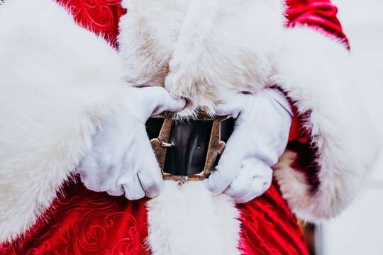 Santa Claus Hands In Belt