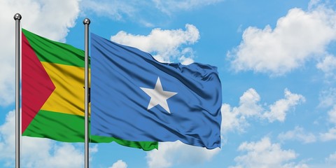 Sao Tome And Principe and Somalia flag waving in the wind against white cloudy blue sky together. Diplomacy concept, international relations.