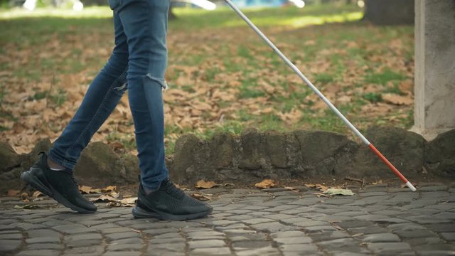 Visually impaired man with walking stick.handicapped person in his daily life