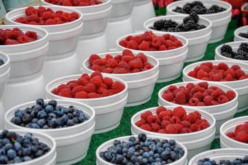 strawberries and blueberries sold in polystyrene bowls are healthy to eat and bad for the environment.