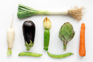 fresh vegetables knolling composition on white background