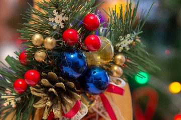 Christmas background,Beautiful Christmas background of green branch with cone and balls