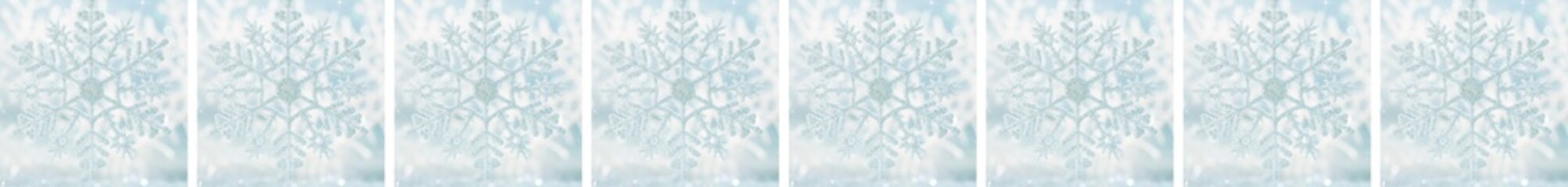 Border snowflake on a blue festive background. Beautiful Christmas background
