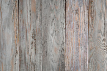 Gray wooden background with old painted boards