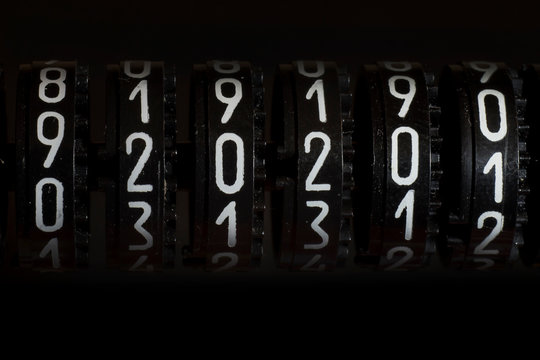 Black wheels with white numbers in the counter